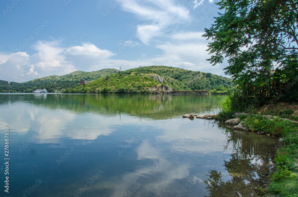 Fototapeta premium Lake and mountain - reflection scene - Macedonia, Veles city, Mladost Lake