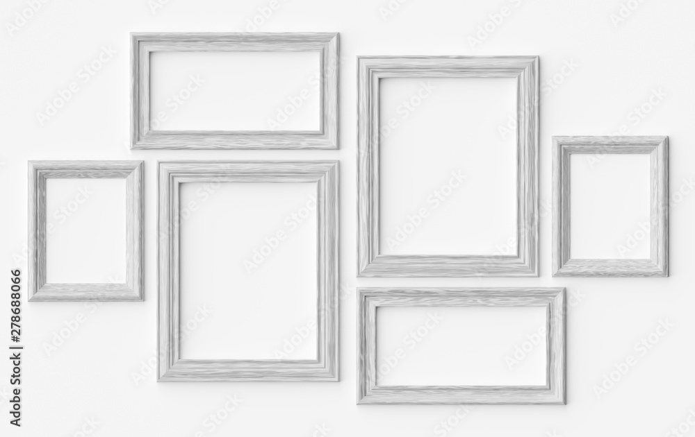 White wooden picture or photo frames on white wall with shadows White wooden picture or photo frames on white wall with shadows