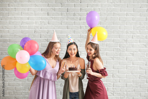 Happy women with Birthday c...