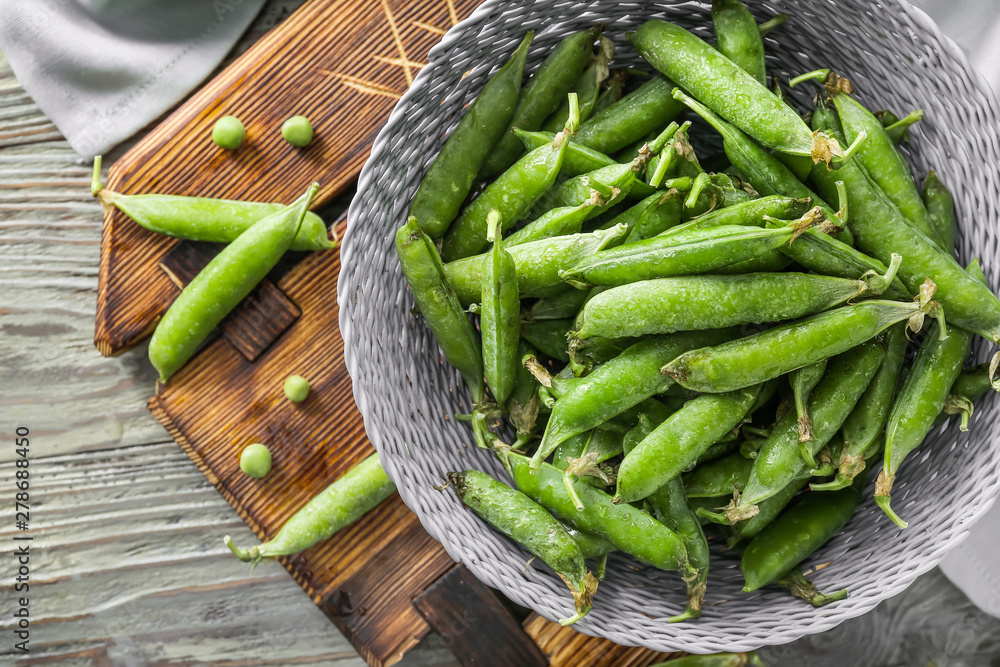 Bowl with tasty fresh peas on table Bowl with tasty fresh peas on table
