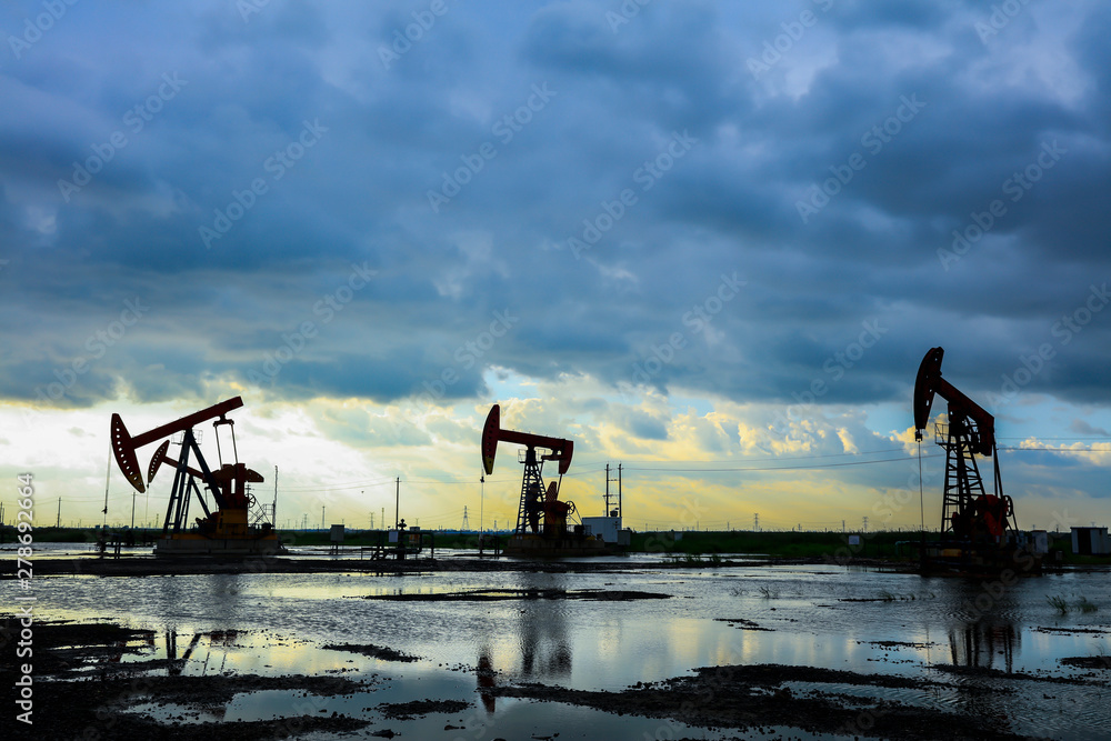 in the evening, oil pumps are running