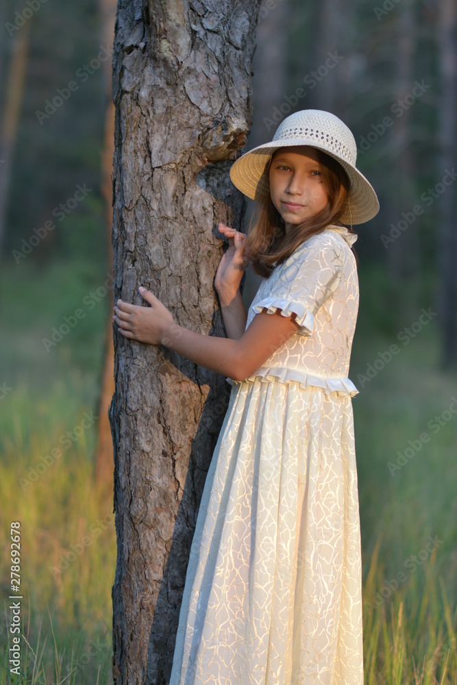 girl in the forest at sunset