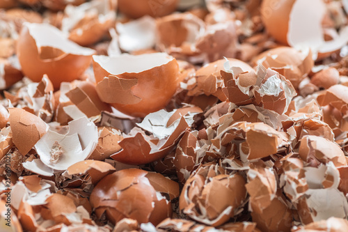 A close up of pile of empty cracked eggshells use for background texture.