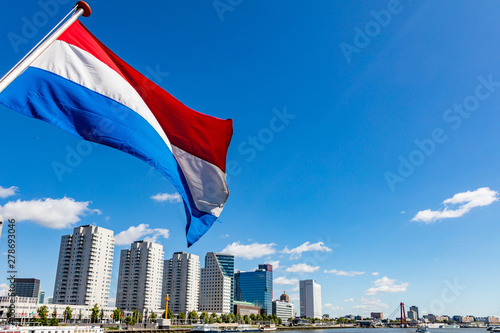 Dutch national flag waving on a boat in Rotterdam