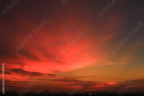 The sky background with red clouds  after from sunset © chaphot