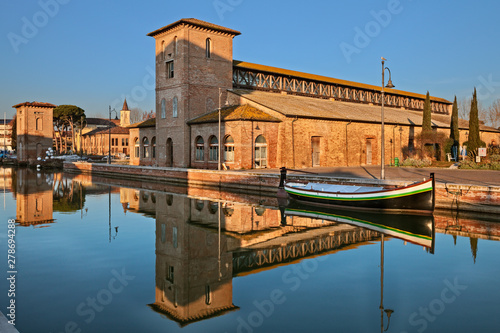 Cervia, Ravenna, Emilia-Romagna, Italy: the port canal with the ancient salt warehouse