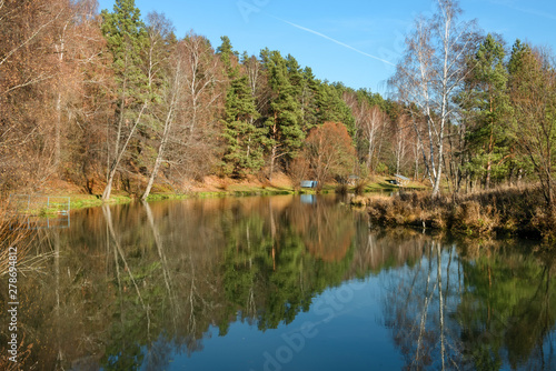 Autumn forest river water panorama. Natural color.
