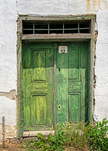 Old green wooden door in Hu...