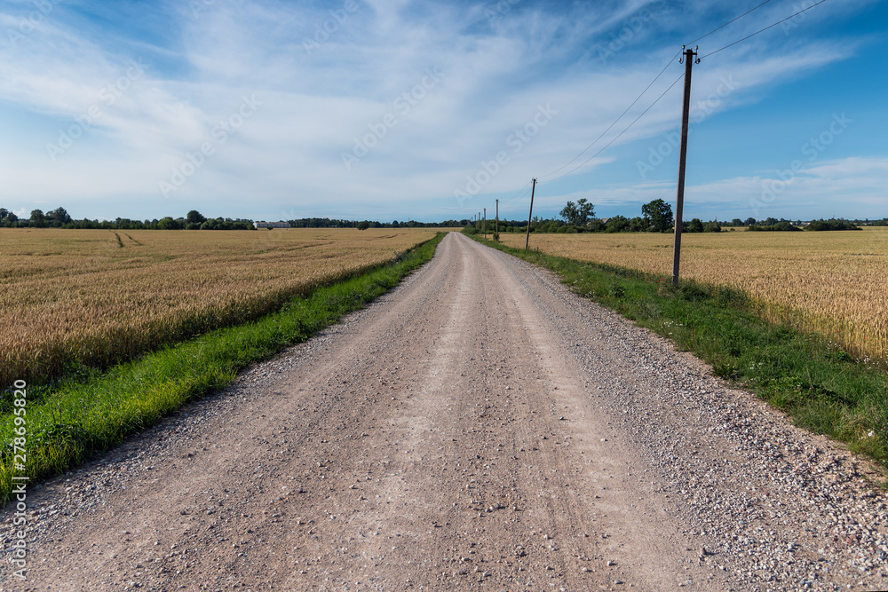 Gravel road in countryside of Latvia.