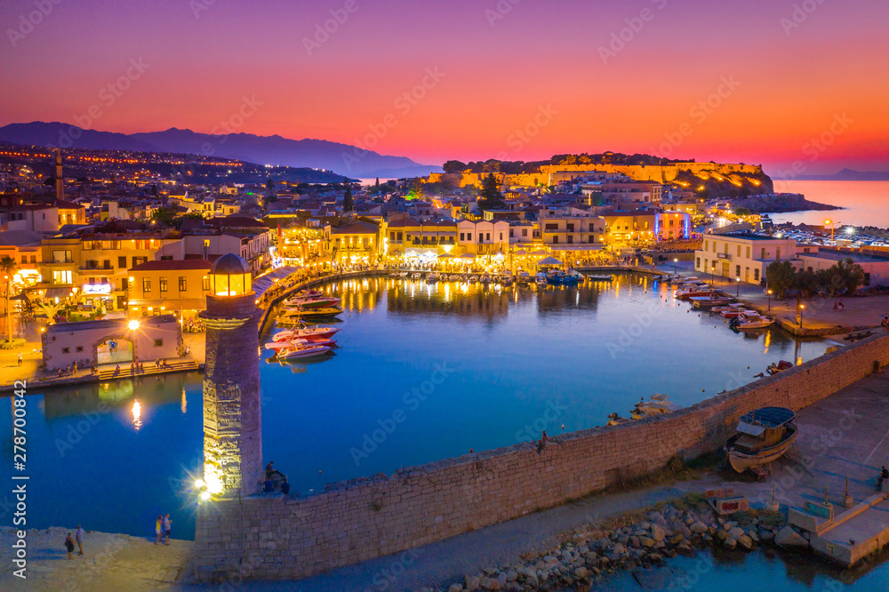 Rethymno city at Crete island in Greece. Aerial view of the old venetian harbor.