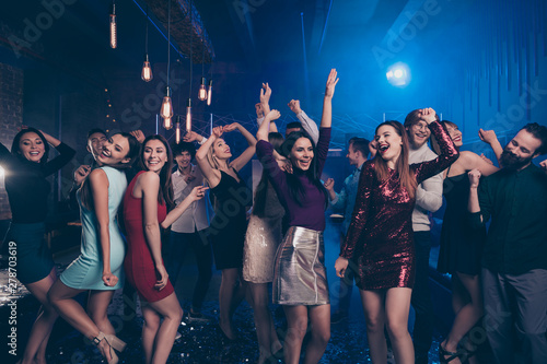 Portrait of crazy millennial youth enjoy party maker having fun moving indoors spotlight wear dress suit skirt graduation