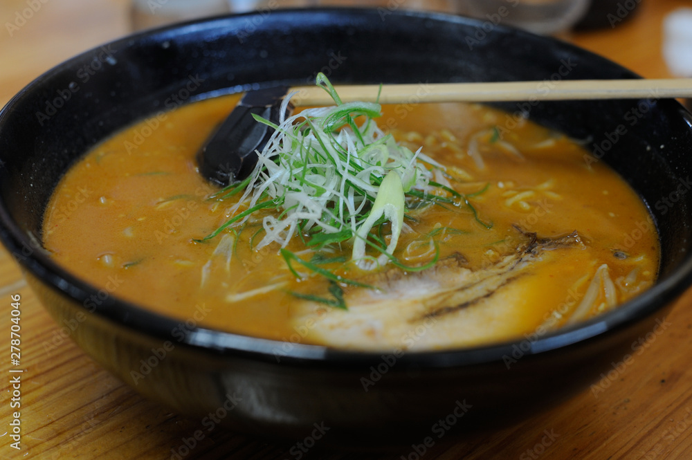 Traditional delicious ramen soup in a bowl in Japan Traditional delicious ramen soup in a bowl in Japan