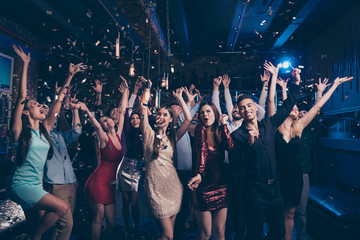 Portrait of good-looking festive lady guy having fun raise hands arms shout laugh emotional have vent holidays free time rejoice suit dress discotheque