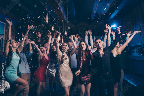 Portrait of good-looking festive lady guy having fun raise hands arms shout laugh emotional have vent holidays free time rejoice suit dress discotheque