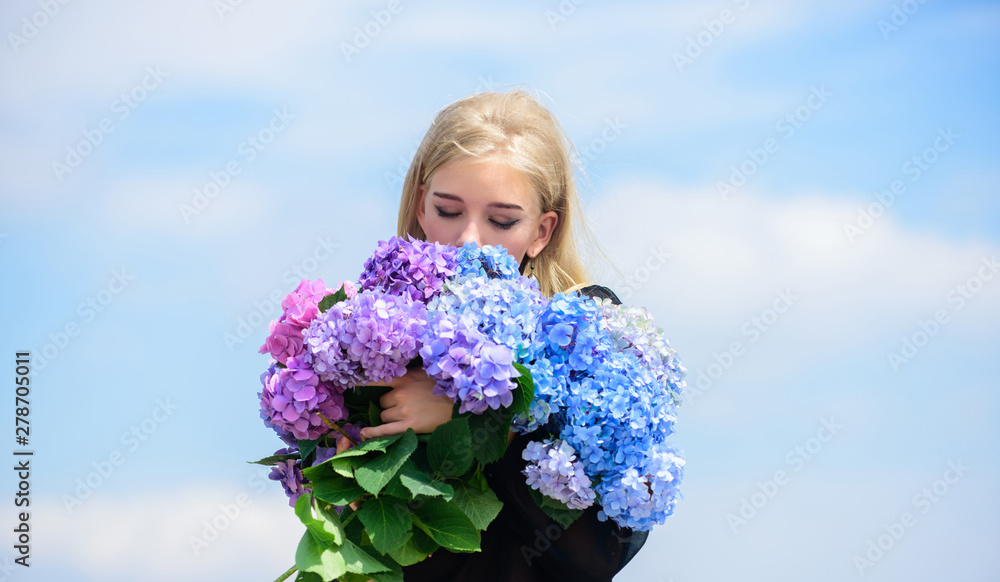 Enjoy spring without allergy. Springtime bloom. Pollen allergy. Gentle flower for delicate woman. Girl tender blonde hold hydrangea flowers bouquet. Allergy free life. Stop allergy blooming season