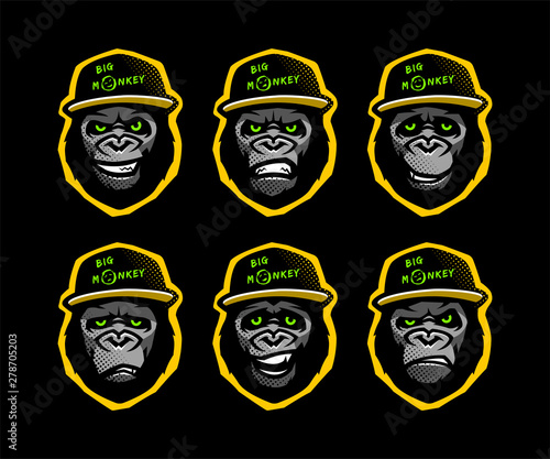 Angry gorilla head in the baseball cap on a dark background. Vector illustration.