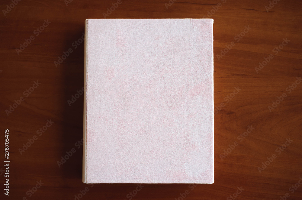 Invitations, notepad, handmade notebook on the wooden table. Invitations, notepad, handmade notebook on the wooden table.