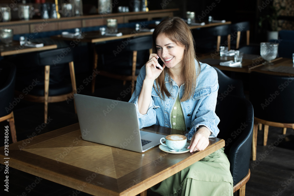 young girl drinking coffee and talking on the phone young girl drinking coffee and talking on the phone