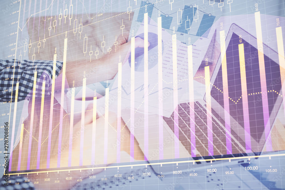Forex graph with businessman working on computer in office on background. Concept of hardworking. Multi exposure. Forex graph with businessman working on computer in office on background. Concept of hardworking. Multi exposure.