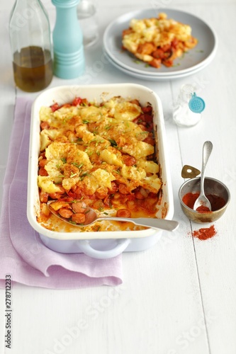 sausage, pepper and mushrooms bake with potatoes and cheese photo