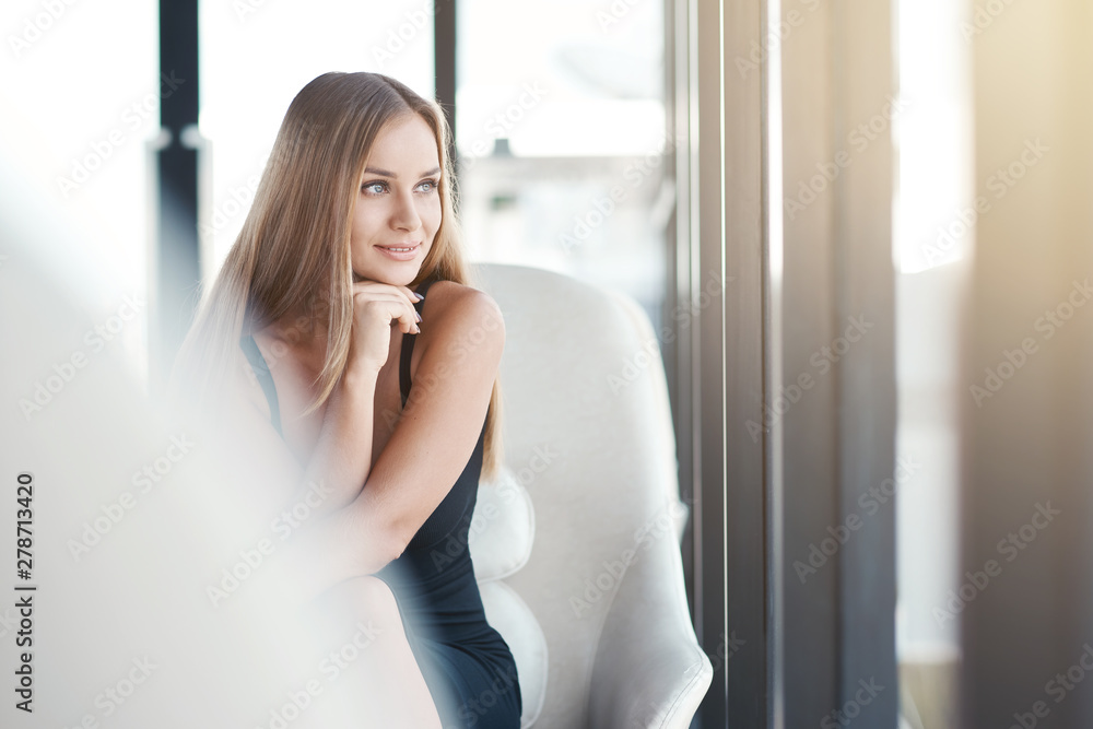 The secret to getting ahead is getting started. Confident beautiful businesswoman is ready to work. Copy space on the right side The secret to getting ahead is getting started. Confident beautiful businesswoman is ready to work. Copy space on the right side