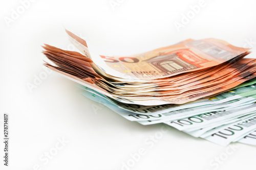 Pack euro money banknotes on white background. Euro cash background. Money savings concept.