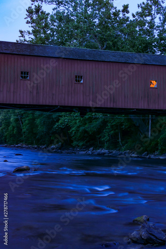 West Cornwall, Connecticut USA The famous covered bridge over the Housatonic River. photo