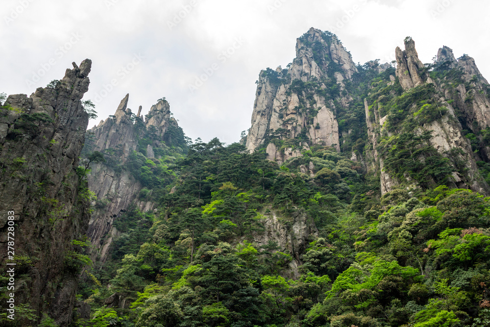 Naklejka premium Landscape scenic spot of Huangshan (Yellow Mountains). A mountain range in southern Anhui province in eastern China. It is a UNESCO World Heritage Site.