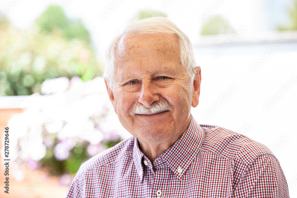 portrait of senior man look in to the camera and relaxed portrait of senior man look in to the camera and relaxed