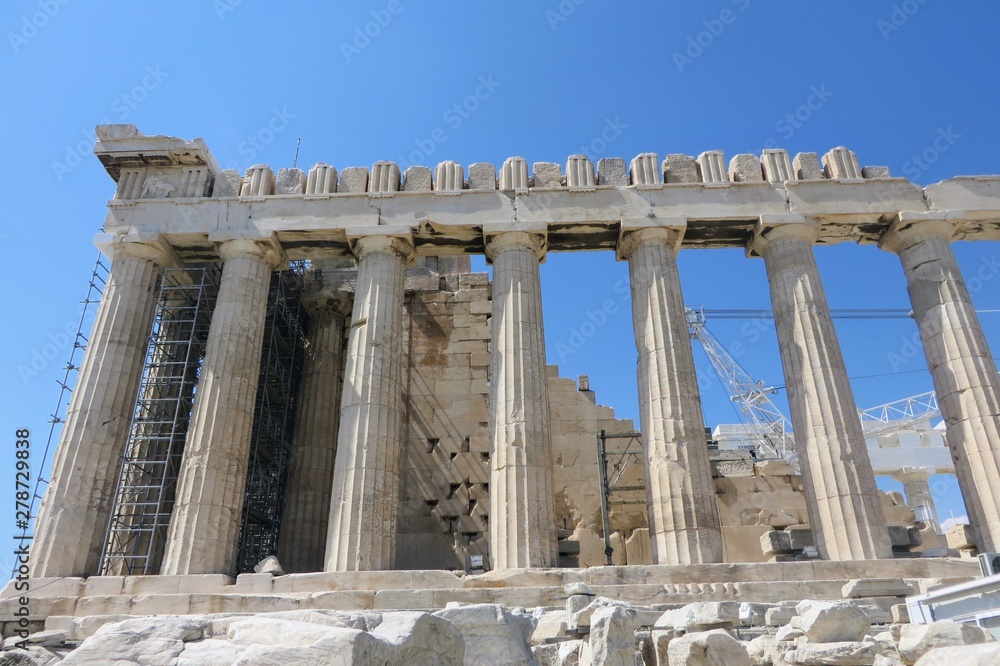 A closeup view of the ancient wonder the Parthenon atop the Acropolis, in Athens, Greece.  The temple is undergoing construction to fix parts of the Parthenon.