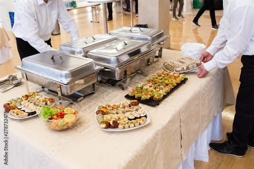 Catering buffet with food on table. photo