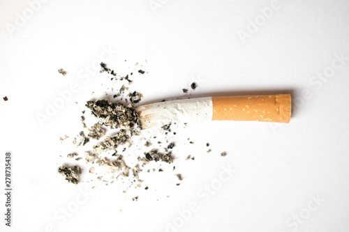 Close up of a single cigarette butt with ashes