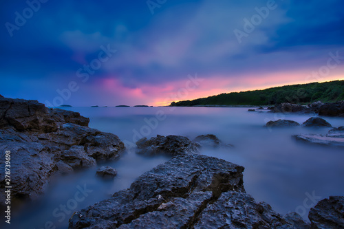 Vestar beach rocks in Croatia after sunset