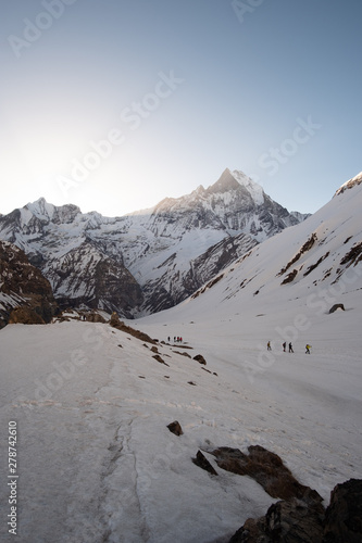 Landscape with Machapuchare-Fishtail peak view red sky from Tadapani during trekking in Himalaya Mountains, Nepal.