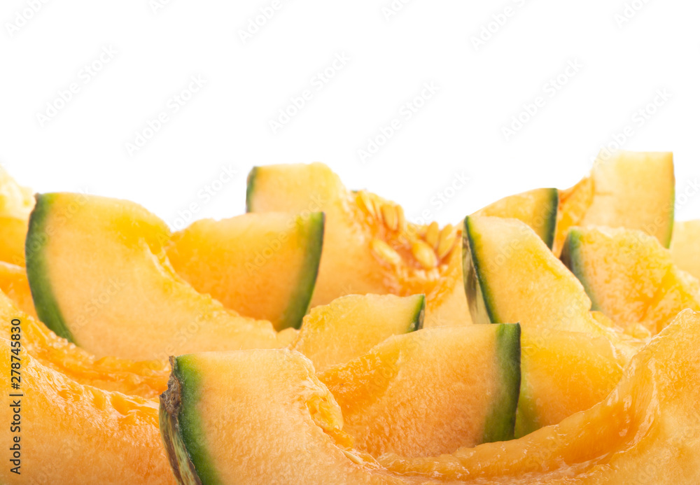 heap of slices of cantaloupe isolated on white background heap of slices of cantaloupe isolated on white background
