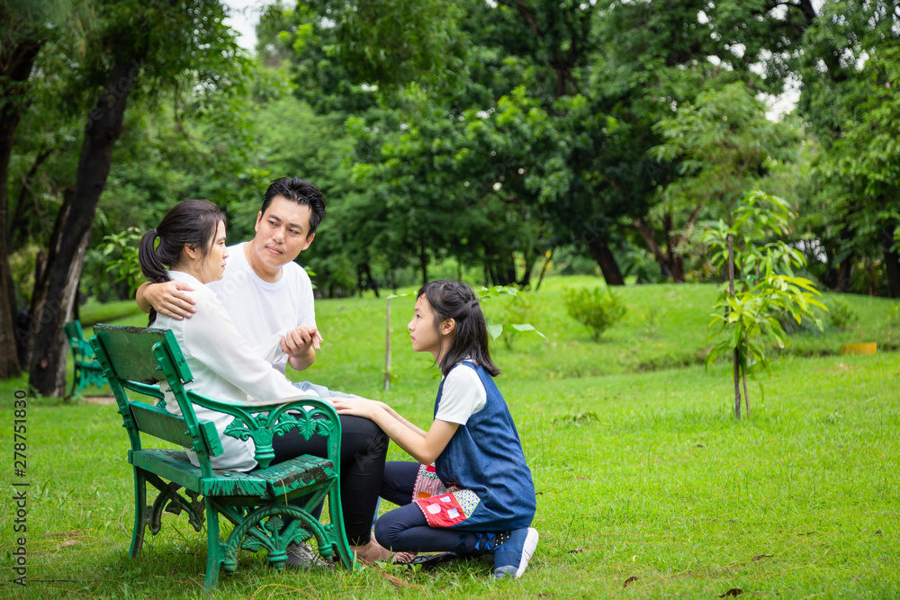 Asian family,husband holding hand comforting wife,father care mother depressive,alzheimer,child girl or daughter helping,support,depression woman patient,feel sad at park,family,health care concept Asian family,husband holding hand comforting wife,father care mother depressive,alzheimer,child girl or daughter helping,support,depression woman patient,feel sad at park,family,health care concept