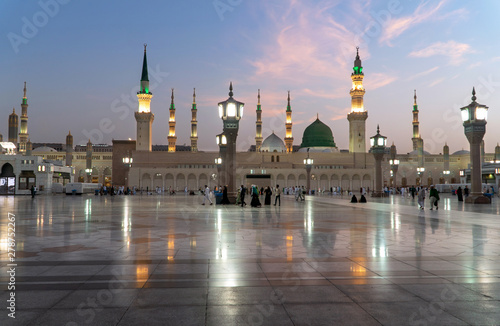 Muslims wearing traditional clothing in the temple of the Nabawi Mosque