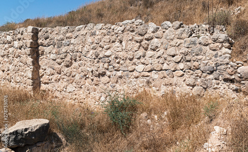 ruins and partial reconstruction of a stone wall at Tel Lachish in the Judean Hills near Moshav Lachish in israel photo
