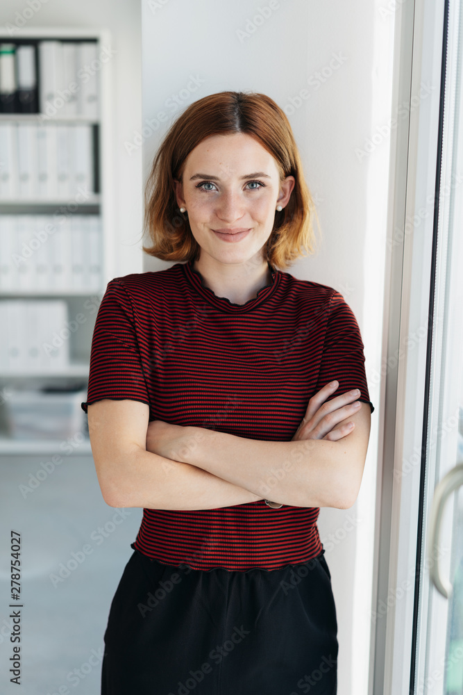 Young woman with a lovely warm friendly smile