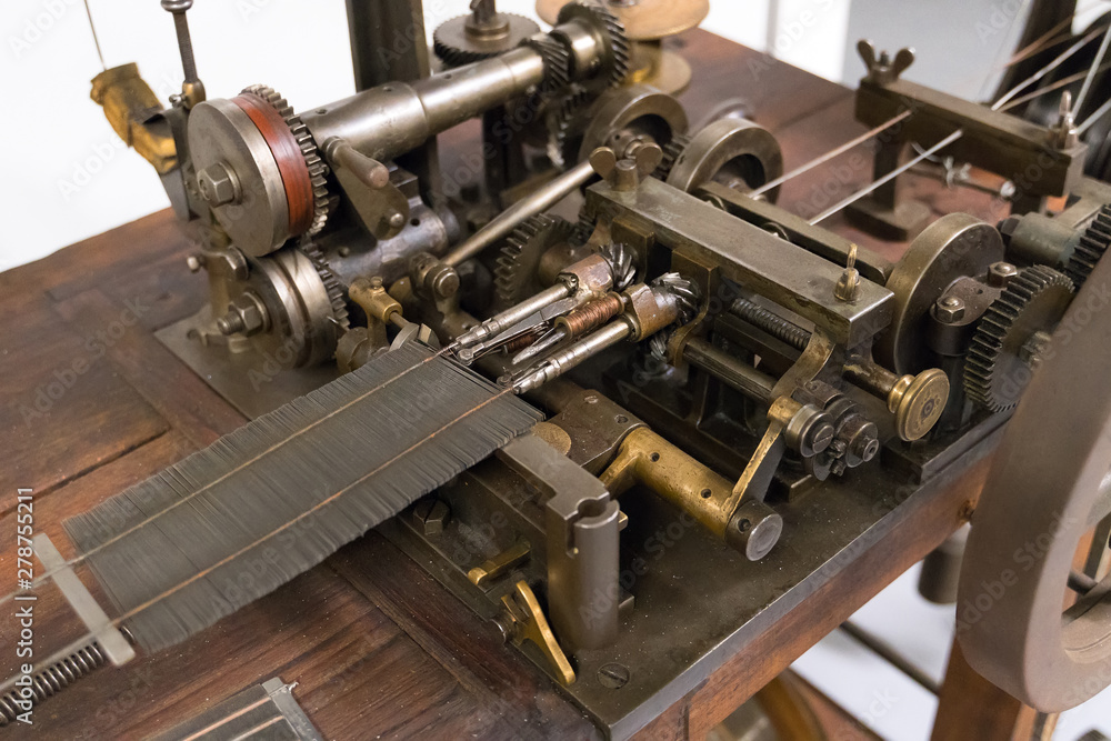 Old reed binding machine for weaving.