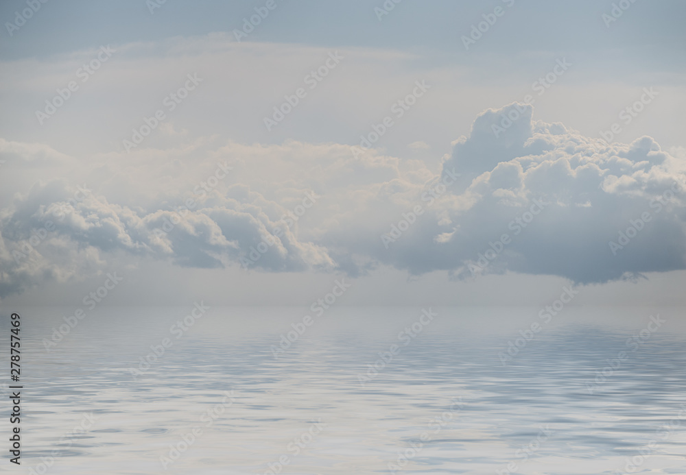 Sky with clouds reflected in water.