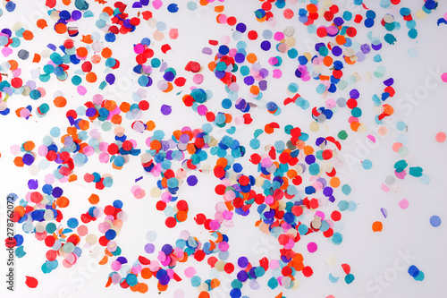 Colorful confetti on white background. Happy celebration party