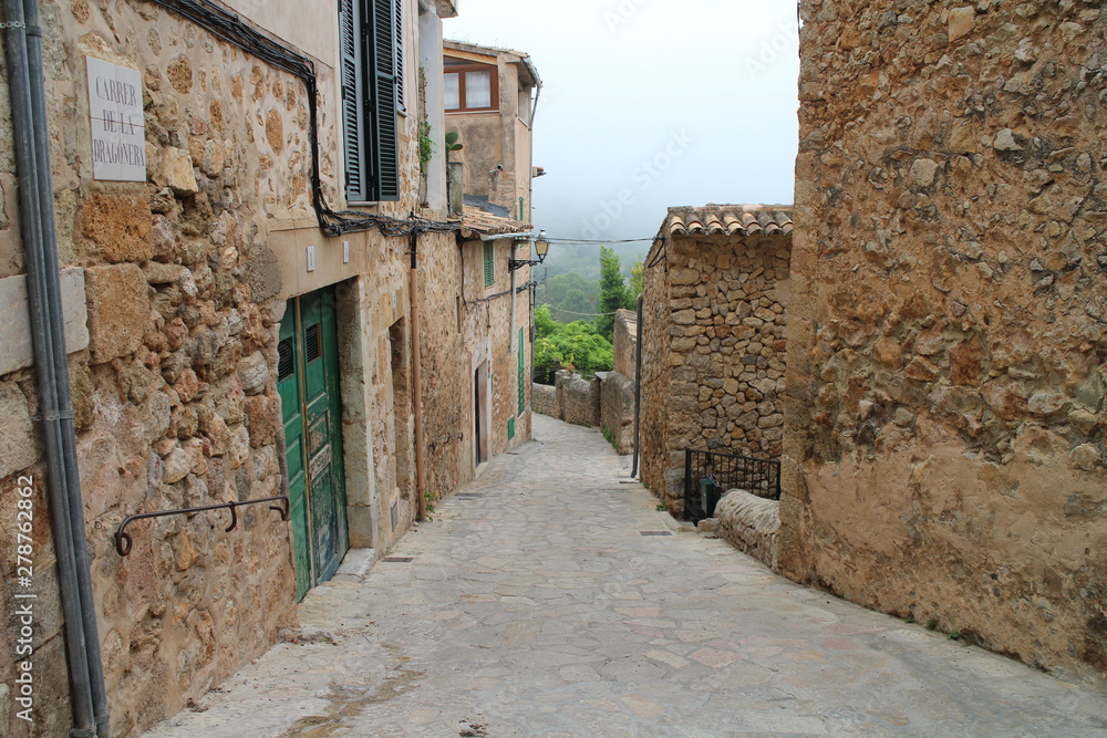 Narrow street in Valldemossa, West Coast, Mallorca, Spain