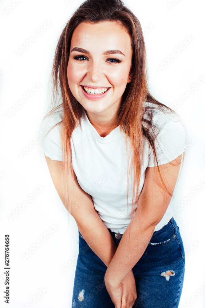 young pretty teenage hipster girl posing emotional happy smiling on white background, lifestyle people concept close up young pretty teenage hipster girl posing emotional happy smiling on white background, lifestyle people concept close up