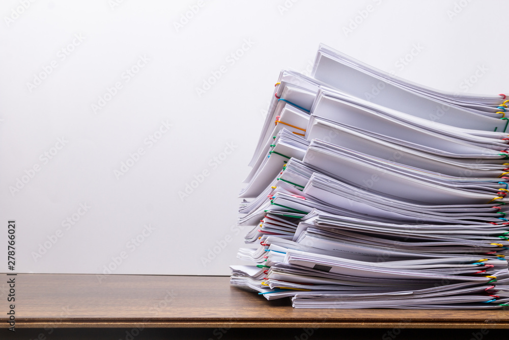 Stack of document paper with colorful paperclip Stack of document paper with colorful paperclip