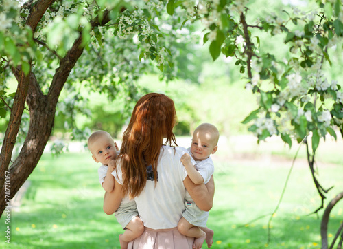 young mother with two babies