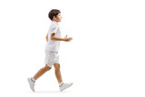 Boy in white shorts and t-shirt running