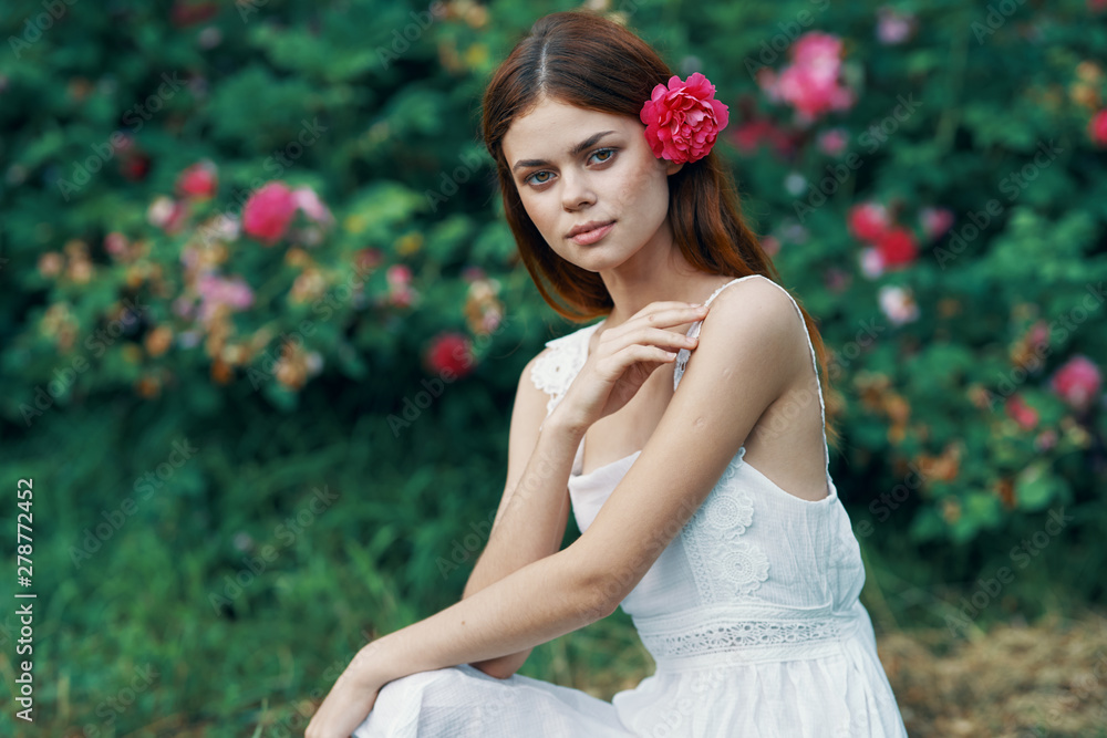 beautiful woman on green leaves park nature beautiful woman on green leaves park nature