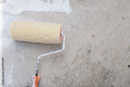 paint roller on floor