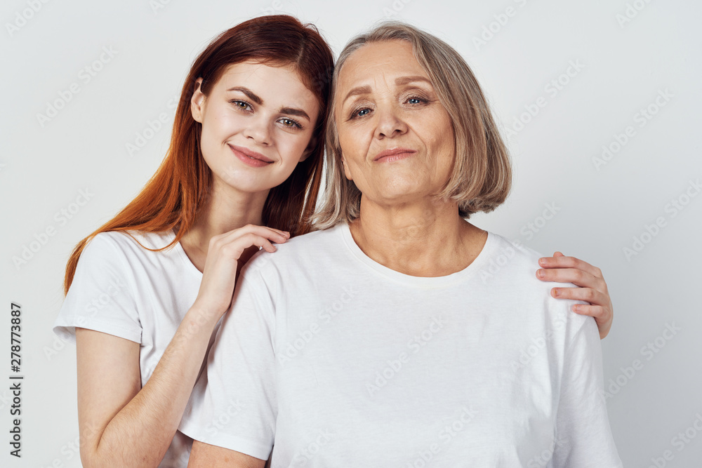 portrait of mother and daughter isolated on white portrait of mother and daughter isolated on white
